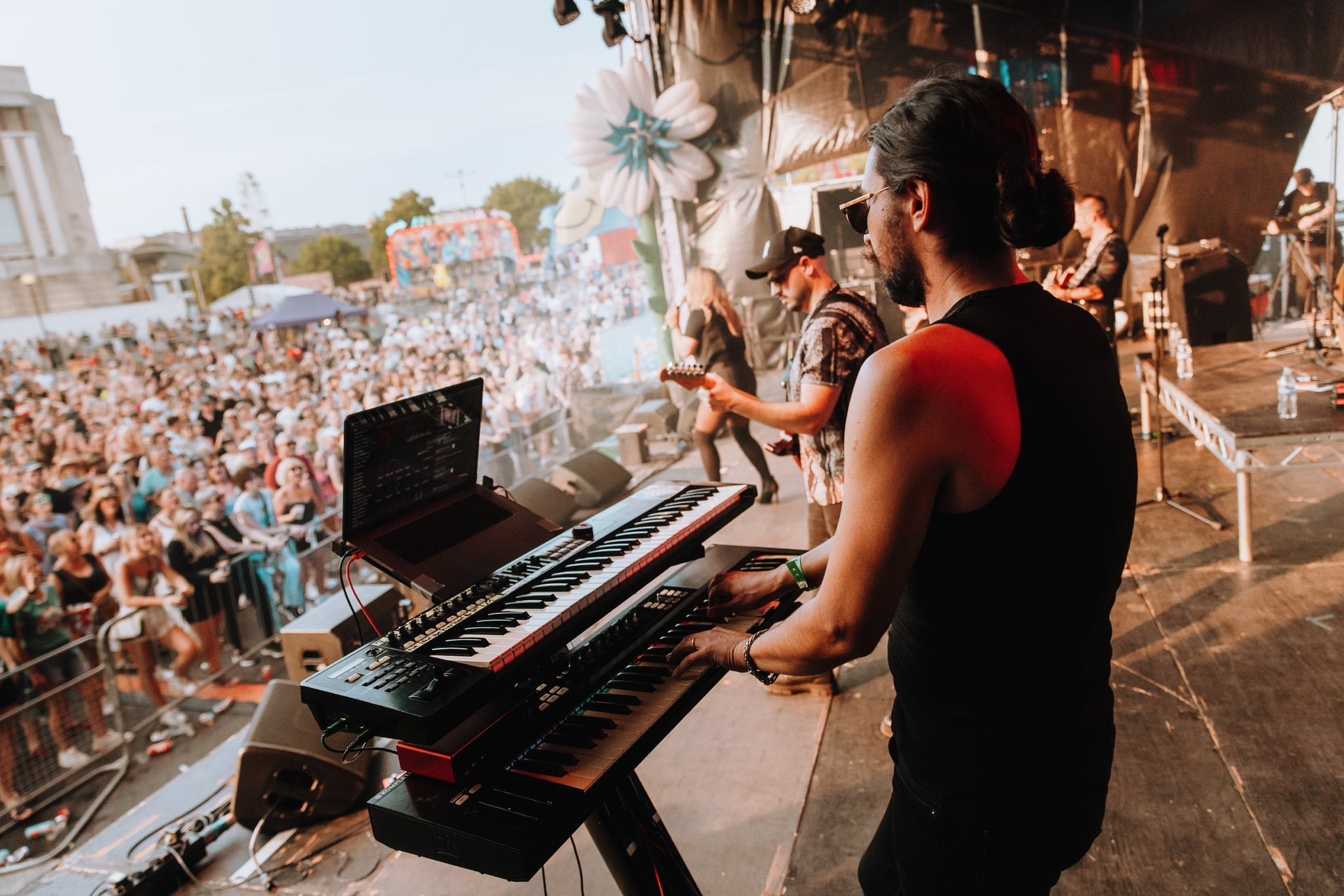 Rock Iconic full band on stage with lights
